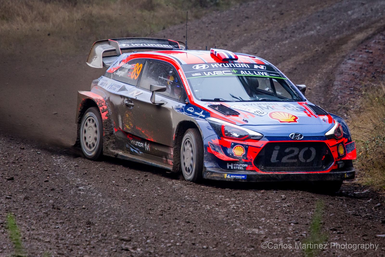 WRC Hyundai i20 mid-air on dirt stage